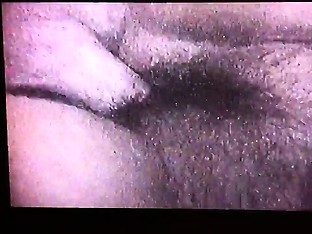 Shy Asian girl with a cute smile flashes the sexy curves of